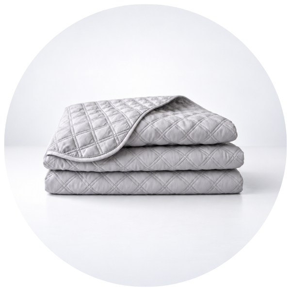 Sposh Quilted Blanket in dove grey, shown folded